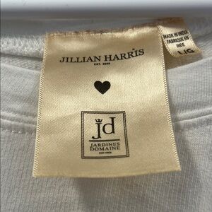 Jillian Harris White dress with Jardines Domaine Tag